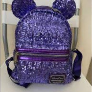 NWOT Disney parks retired loungefly purple potion mini backpack